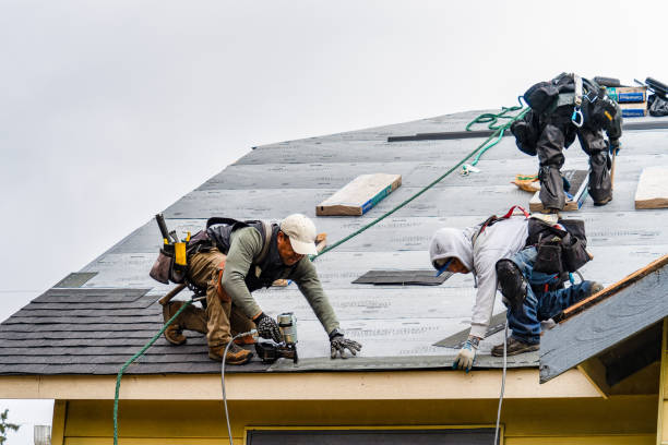 Professional Roofing technician working in Bow, NH